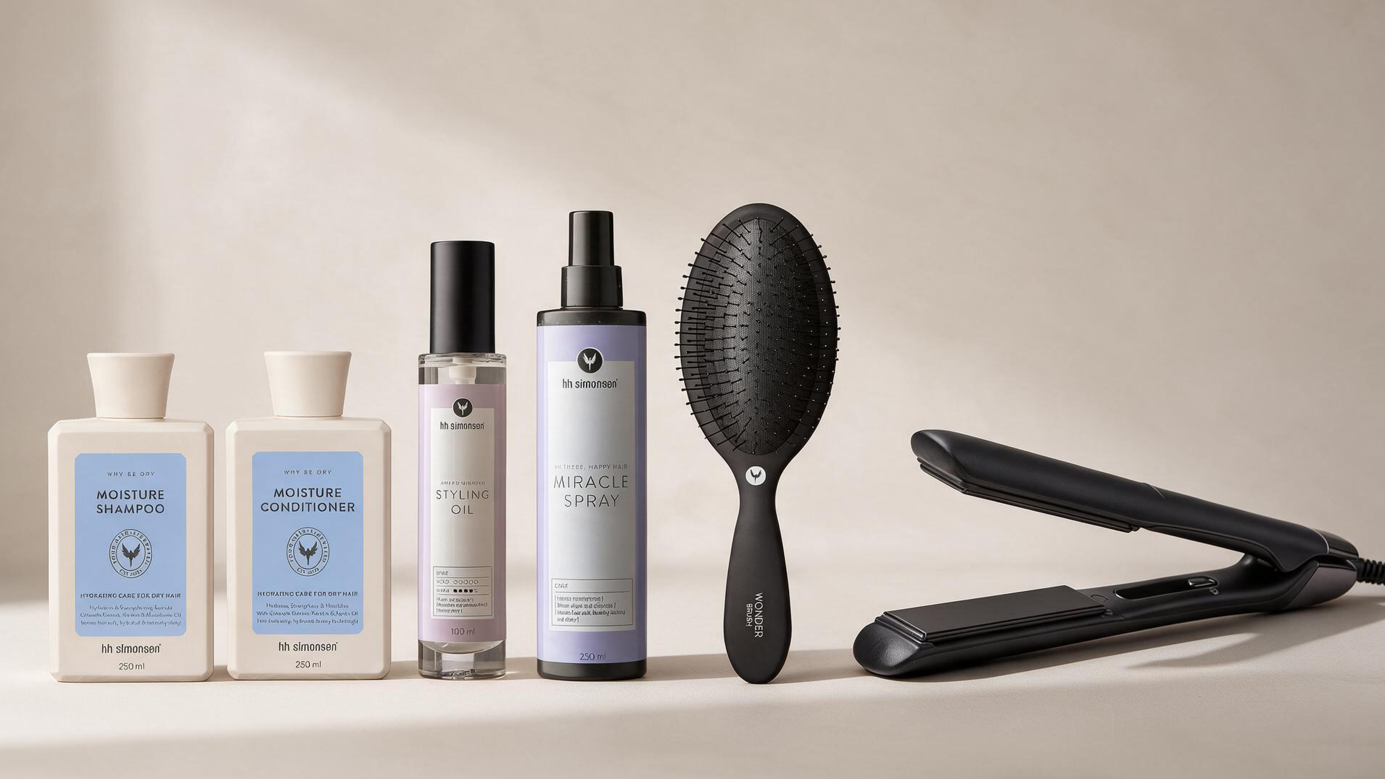 hh simonsen fugtgivende shampoo og balsam, stylingolie, miraclespray, sort hårbørste og glattejern.