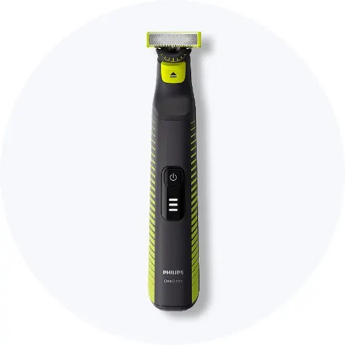Her ses en Philips OneBlade trimmer i sort og limegrøn på en lys baggrund.