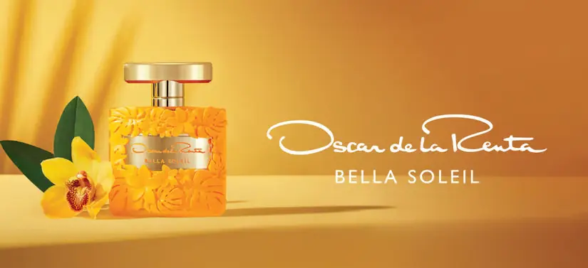Her ses et af Oscar de la Rentas produkter på en gul baggrund.