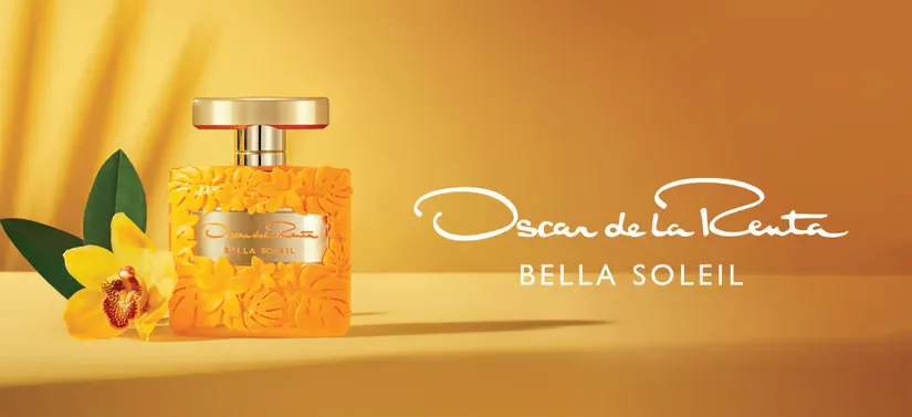 Her ses et af Oscar de la Rentas produkter på en gul baggrund.