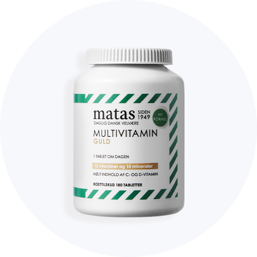 Her ses en grøn og hvid bøtte med multivitamin