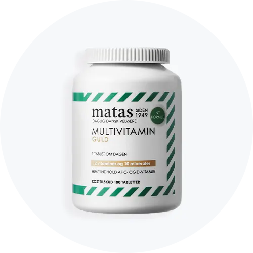 Her ses en grøn og hvid bøtte med multivitamin