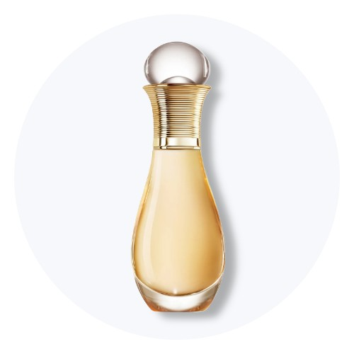 Parfumeflaske med gylden, ribbet hals og klar kugleformet prop, fyldt med gylden væske.