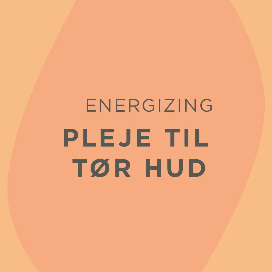 Grafisk billede med varm orange baggrund og bløde former. I midten står teksten ‘Energizing – Pleje til tør hud’ i mørke bogstaver.