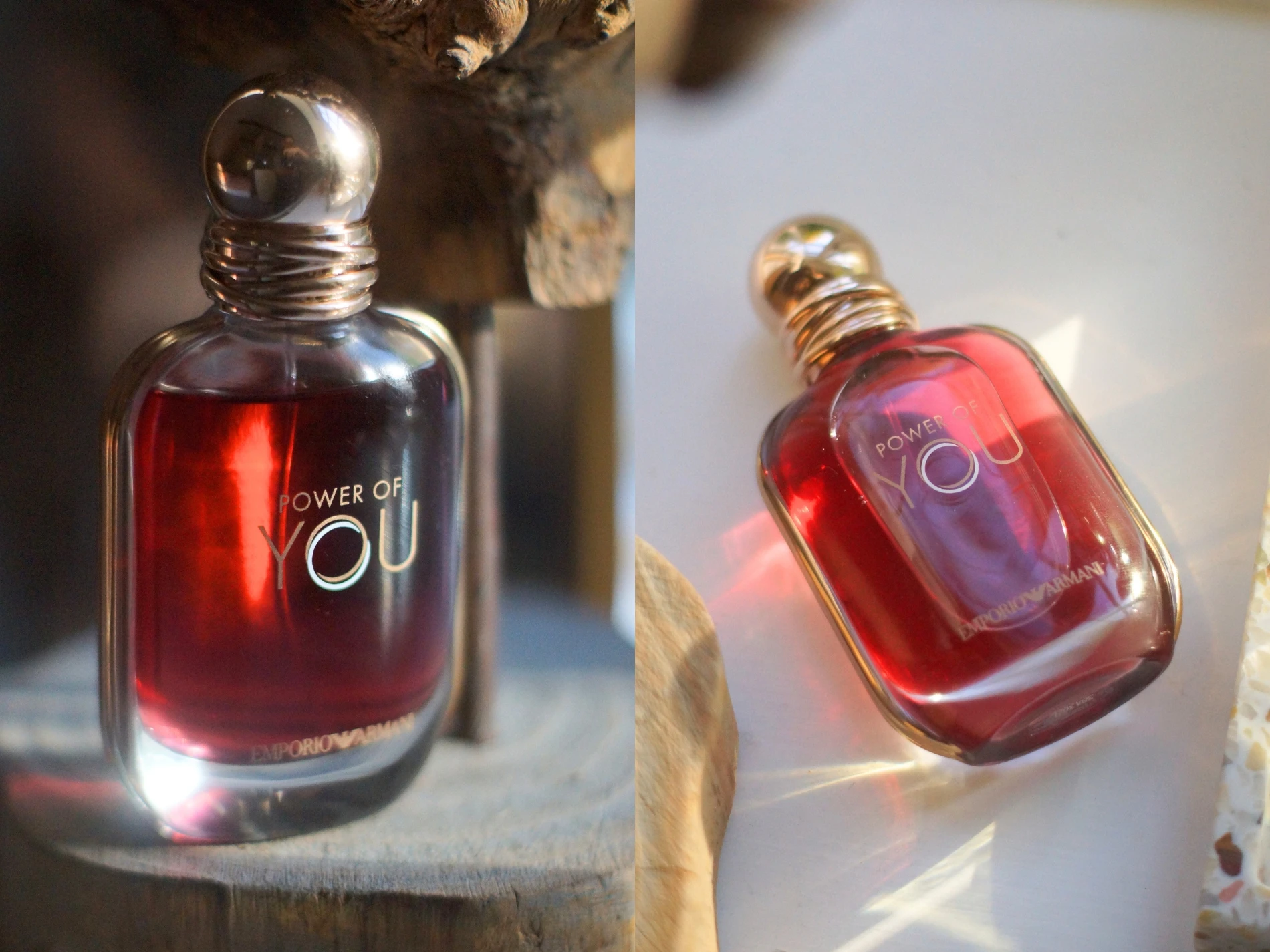 To flasker af Emporio Armani 'Power of You' parfume med rød væske og guldlåg. Den ene står oprejst på træ, den anden ligger ned på et lyst underlag.