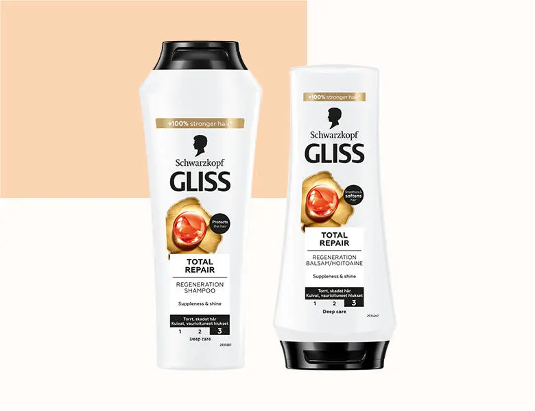 Her ses en hvid og laksefarvet baggrund med en balsam og en shampoo. 