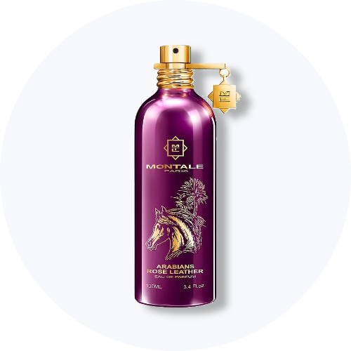 Her ses et billede af en parfumeflakon fra Montale placeret centralt mod en lys, rund baggrund. På flakonen står teksten “MONTALE PARIS ARABIANS ROSE LEATHER”. Flakonen er i metallisk lilla nuance med guldfarvede detaljer og vedhæng.