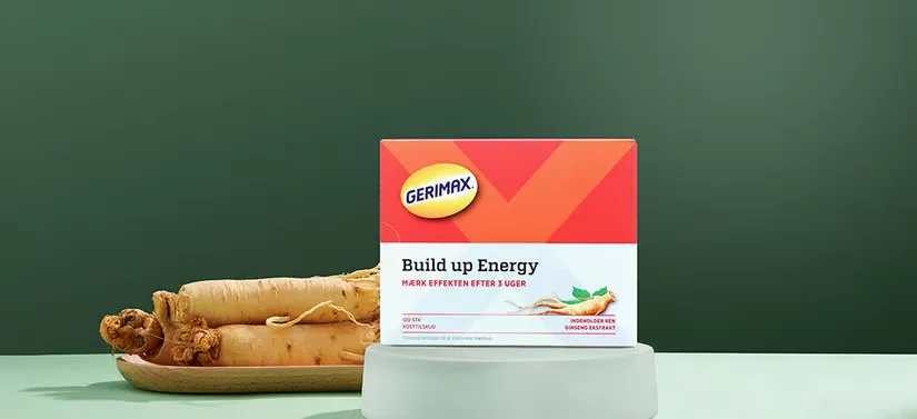 Her ses et Gerimax produkt. Bagved står der en tallerken med nogle rodfrugter og grøn baggrund. 