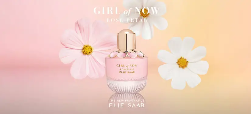 Her ses en Elie Saab parfume på en gul og lyserød baggrund med blomster.