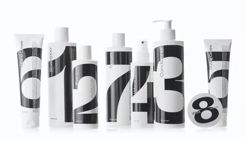 Her ses otte Clean Up produkter på hvid baggrund. 