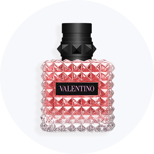Her ses en lyserød Valentino parfume med sort låg på en lys baggrund.