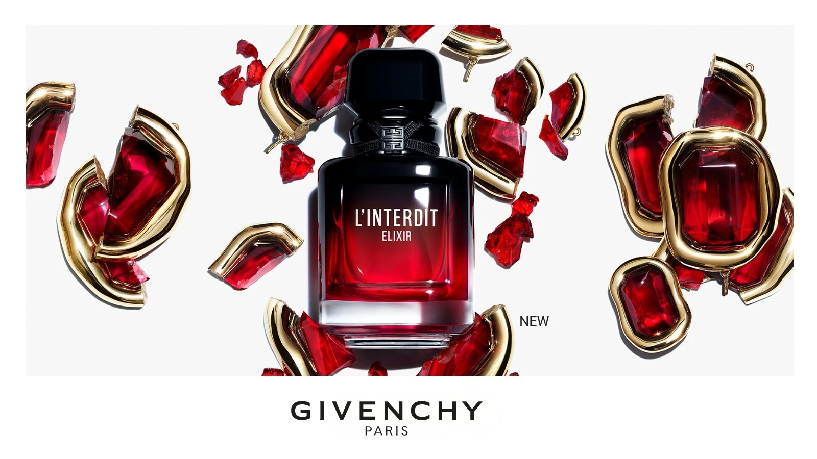 Her ses en Givenchy L'Interdit Elixir på en hvid baggrund med rubinlignende sten omkring. På banneret står der "NEW" og "GIVENCHY PARIS"
