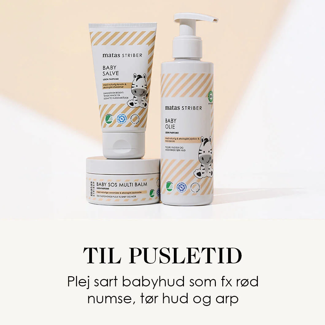 Her ses tre babyprodukter fra Matas Striber på en beige og hvid baggrund. Nederst ses en sort tekst på en hvid baggrund.