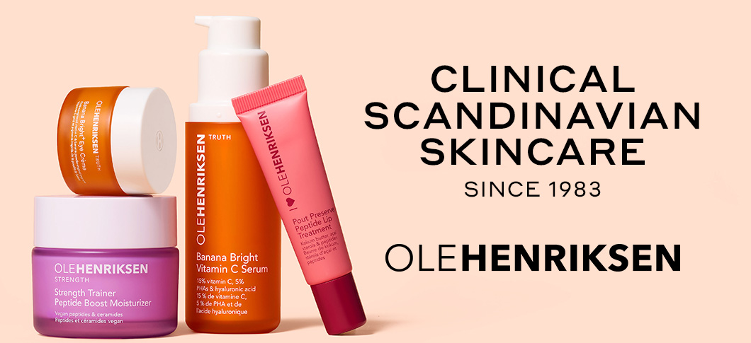 Her ses OLEHENRIKSEN hudplejeprodukter i farverig emballage på en lys beige baggrund med tekst “Clinical Scandinavian Skincare Since 1983 Ole Henriksen.