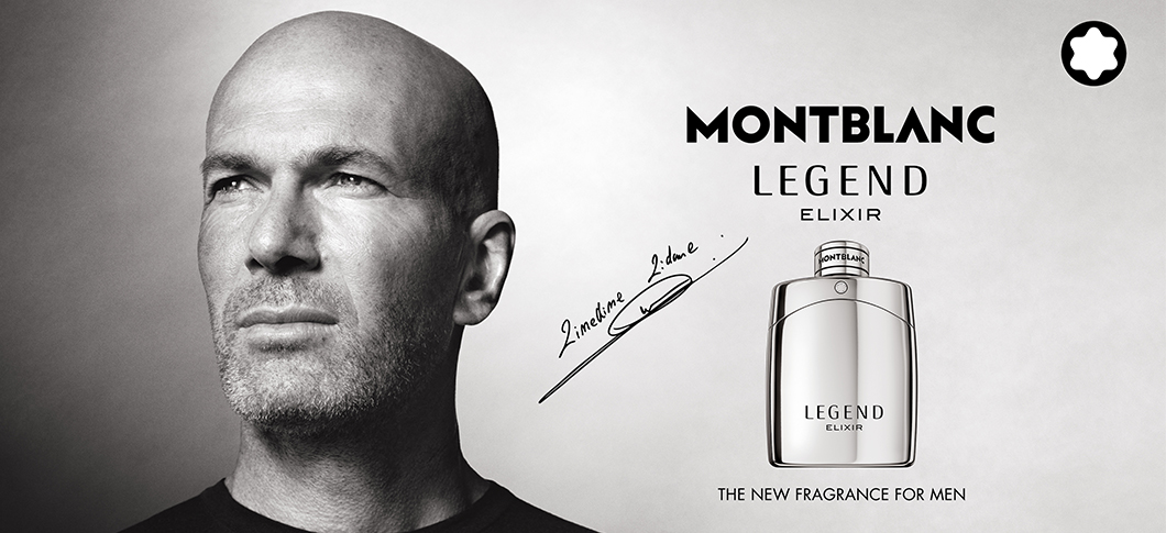 Sort-hvidt banner med nærbillede af en skaldet mand til venstre og en Montblanc Legend Elixir parfume til højre, sammen med Montblanc-logo og tekst om herreduft.