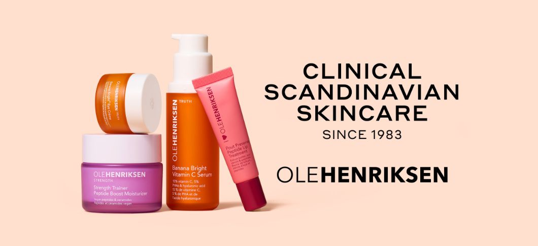 Her ses OLEHENRIKSEN hudplejeprodukter i farverig emballage på en lys beige baggrund med tekst “Clinical Scandinavian Skincare Since 1983 Ole Henriksen.