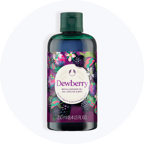 The Body Shop Dewberry bade- og showergel, 250 ml, med brombærillustrationer og teksten 'Wildly Fruity & Deliciously Juicy'.