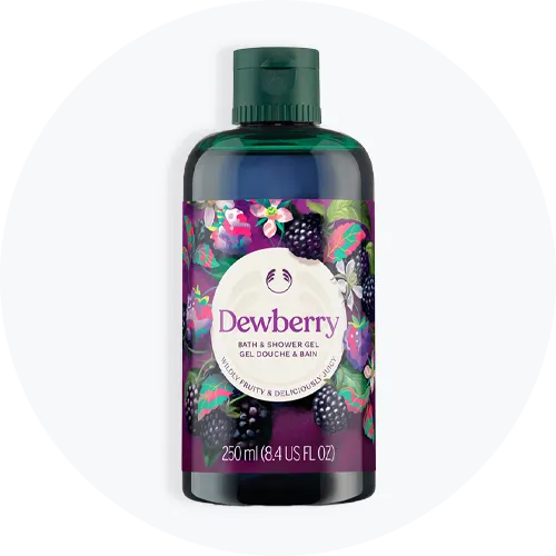 The Body Shop Dewberry bade- og showergel, 250 ml, med brombærillustrationer og teksten 'Wildly Fruity & Deliciously Juicy'.
