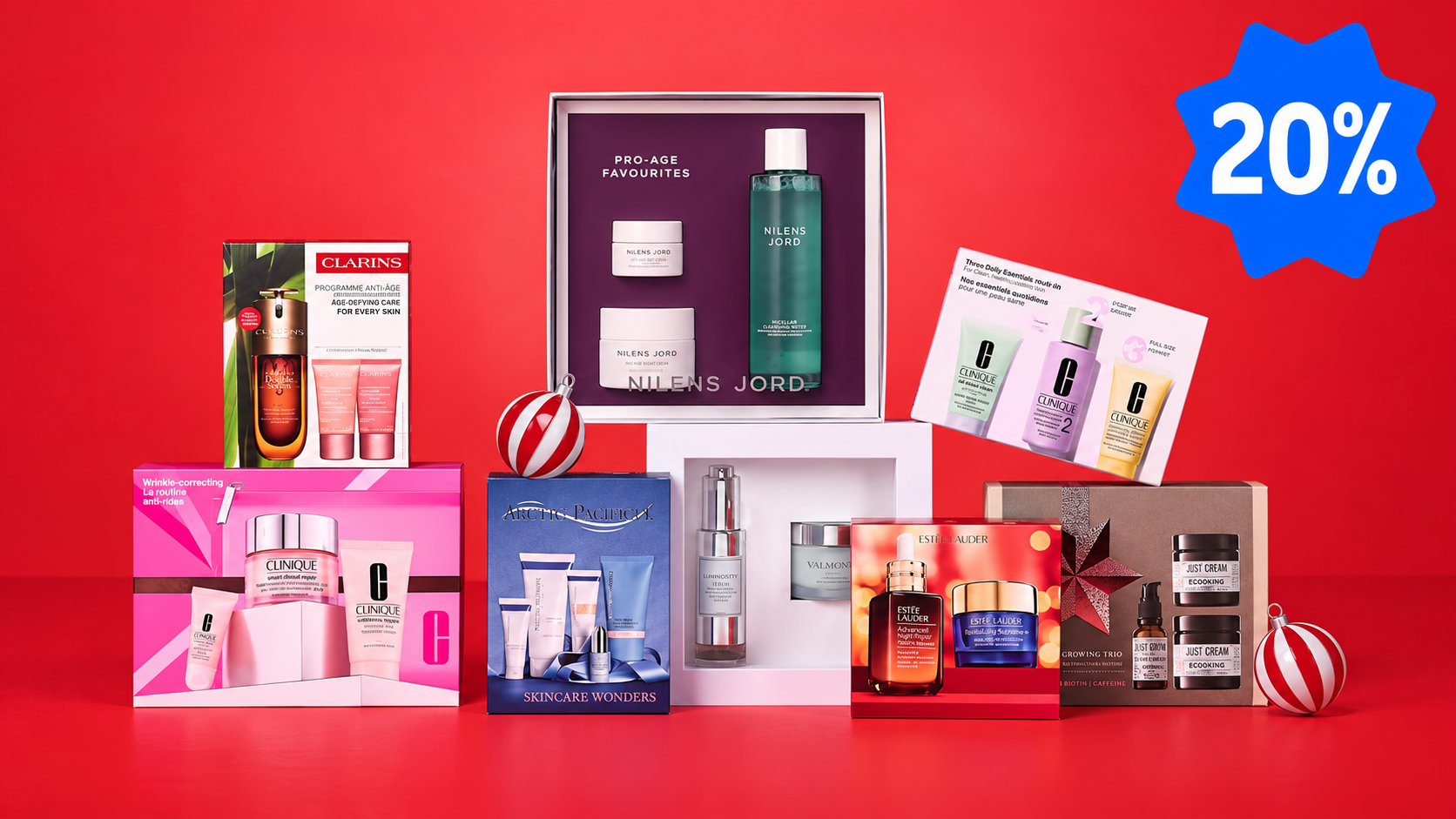 Et udvalg af gavesæt med hudpleje fra Clarins, Clinique og Estee Lauder på rød baggrund med 20% rabat.