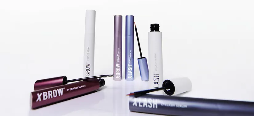 Her ses en hvid baggrund med forskellige Xlash produkter.