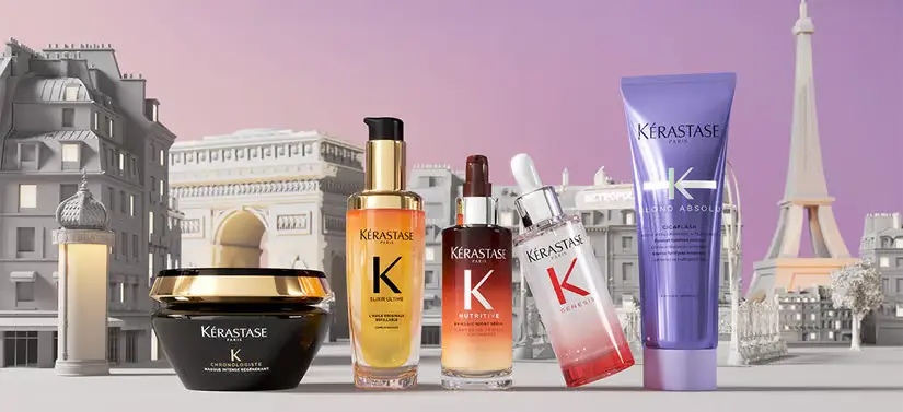 Her ses en by med lilla himmel. Foran ses fem Kérastase produkter. 