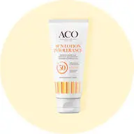 Her ses en vegansk solcreme fra ACO på en lysegul baggrund.