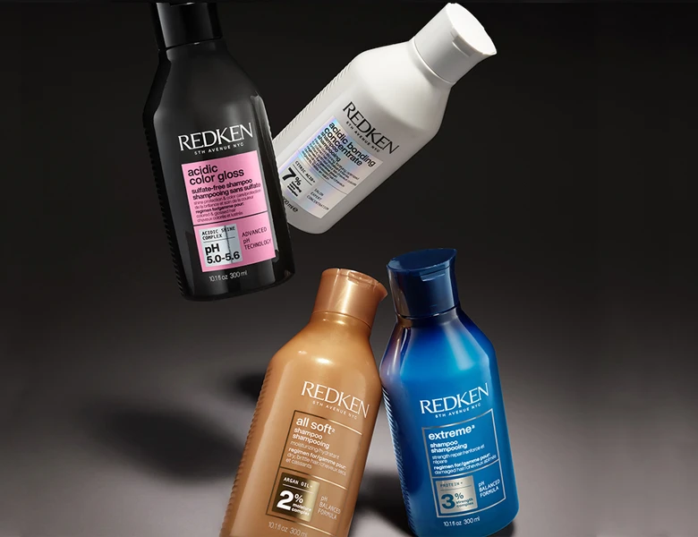 Fire flasker Redken shampoo: Acidic Color Gloss sulfatfri, Acidic Bonding Concentrate, All Soft fugtgivende og Extreme+ protein.