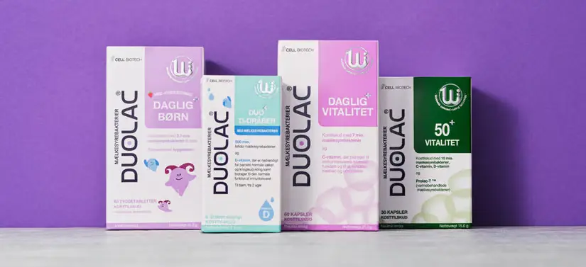 Her ses en lilla baggrund med fire forskellige Duolac produkter. 