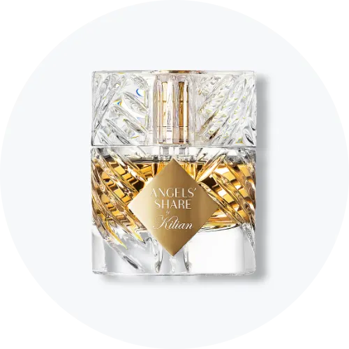 Her ses et billede af en parfumeflakon fra Mugler placeret centralt mod en lys baggrund. På flakonen står teksten “ANGEL ELIXIR”, og den har et facetteret design i klare og gyldne nuancer.