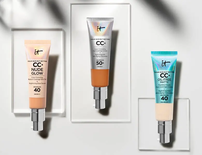 Her ses tre forskellige produkter til en makeupbase på en sølv-grå baggrund.