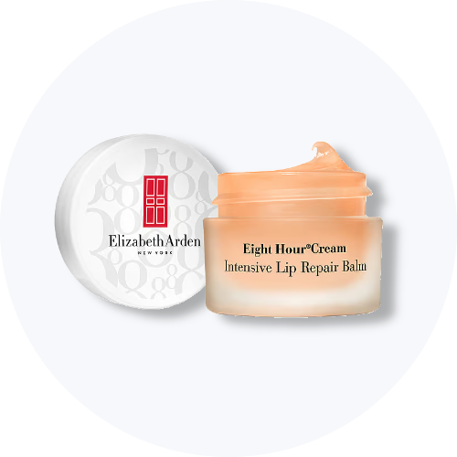 Åben krukke med Elizabeth Arden Eight Hour Cream Intensive Lip Repair Balm ved siden af låget.