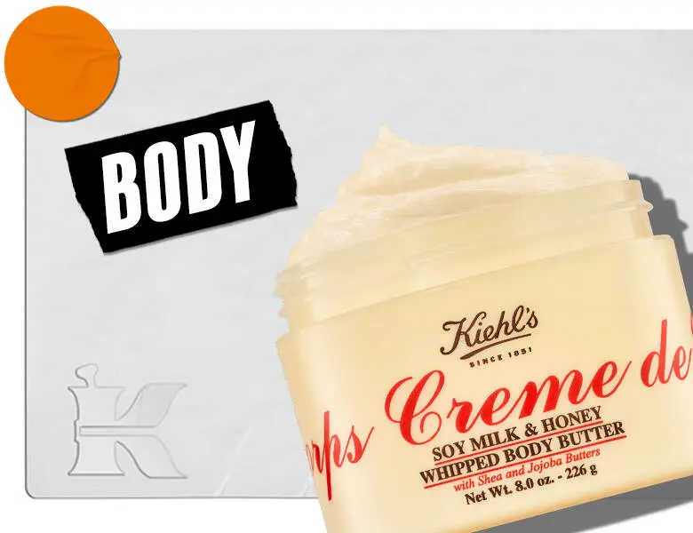 Her ses en lysegrå baggrund med et gult og rødt produkt til højre. Til venstre ses et sort skilt med "body" i hvid.