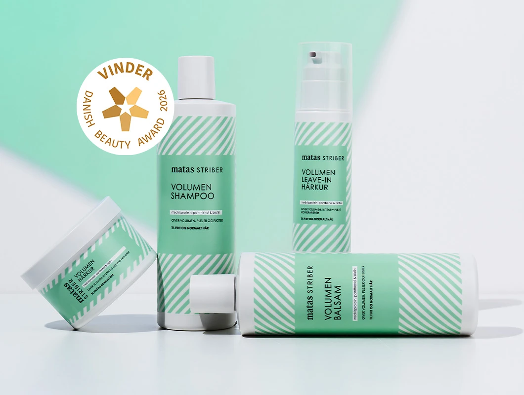 Her ses Matas Striber hårplejeprodukter i grøn og hvid emballage på en lys baggrund med et Danish Beauty Award 2026 mærke.