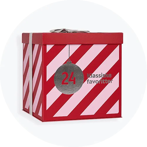 Julekalender i rød og lyserød stribet æske med tallet 24 og teksten 'Klassiske favoritter'.