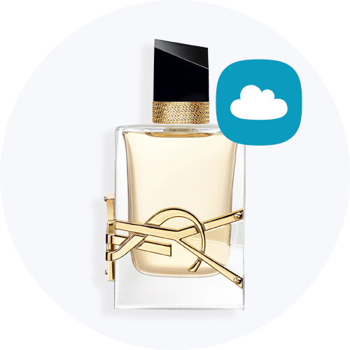 Her ses et billede af en parfumeflakon fra Yves Saint Laurent placeret mod en lys baggrund. Flakonen er i klart glas med guldfarvede detaljer og sort låg, og ved siden af ses et blåt ikon med en sky.