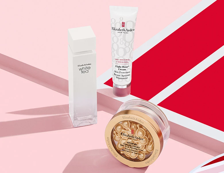 Her ses Elizabeth Arden produkter – parfume, creme og Eight Hour Cream på en lyserød baggrund.