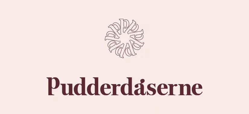 Her ses en sart lyserød baggrund med deres brune logo. 