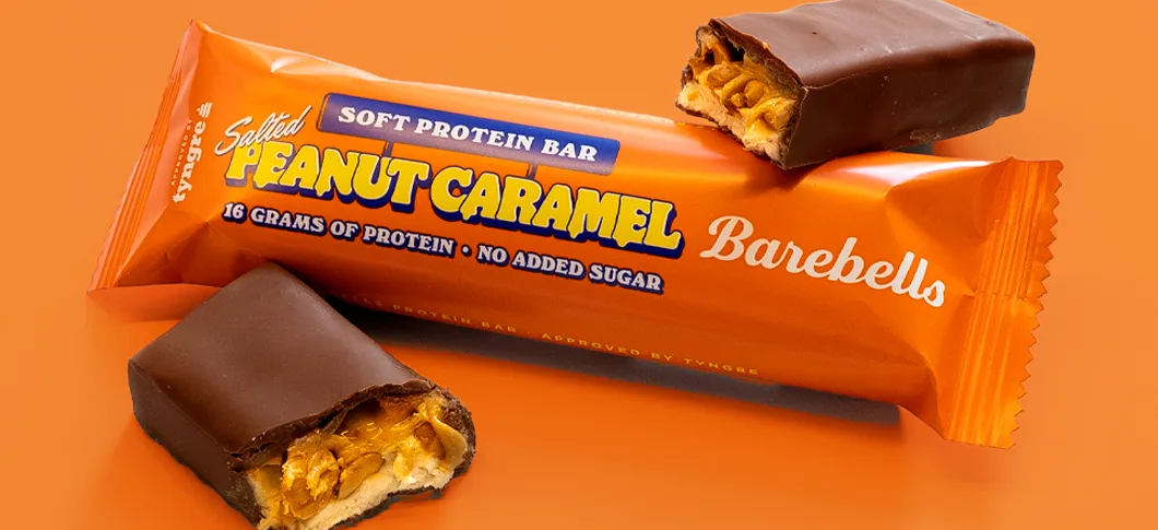 Her ses en pakke med Orange Barebells på orange baggrund
