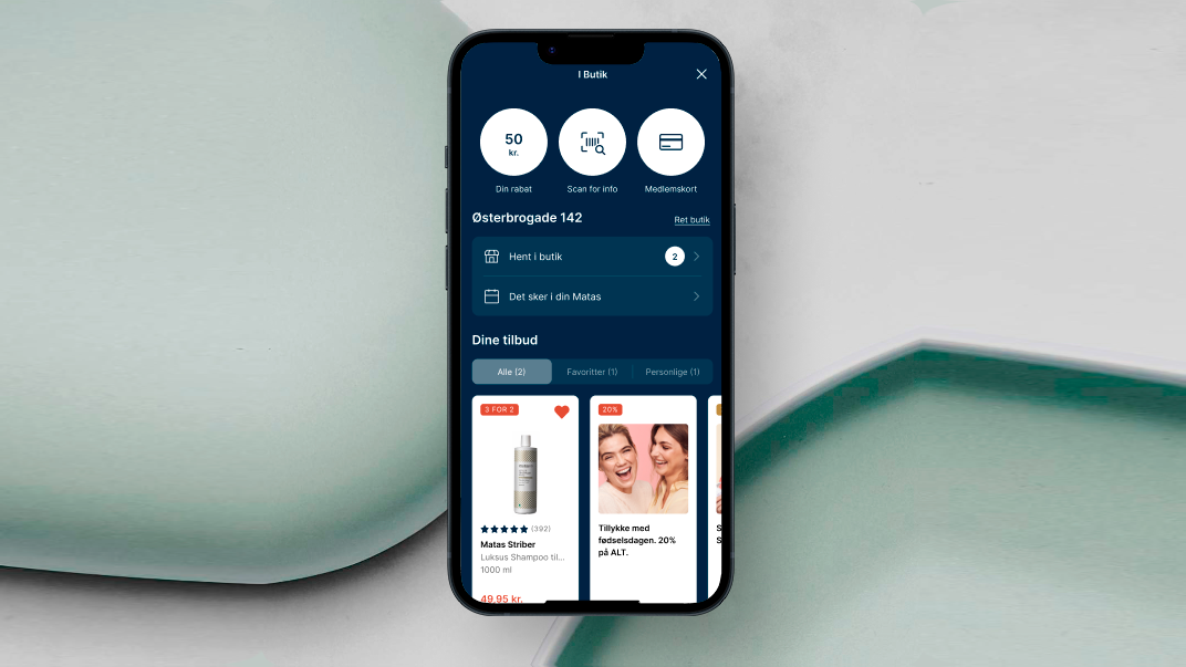 Her ses en mobil, som er inde på matas-appen i "I Butik" fanen.