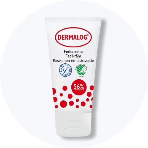 Dermalog fedtcreme 56 % uden parfume i hvid tube med røde prikker på lys grå baggrund.
