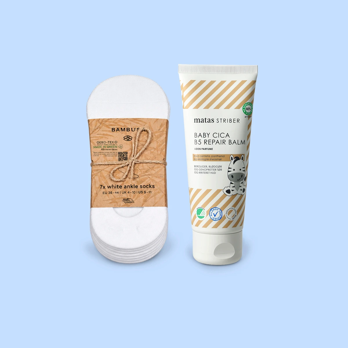 Syv par hvide OEKO-TEX bambus ankelstrømper (str. EU 36-44) og en tube Matas Striber Baby CICA B5 Repair Balm uden parfume.
