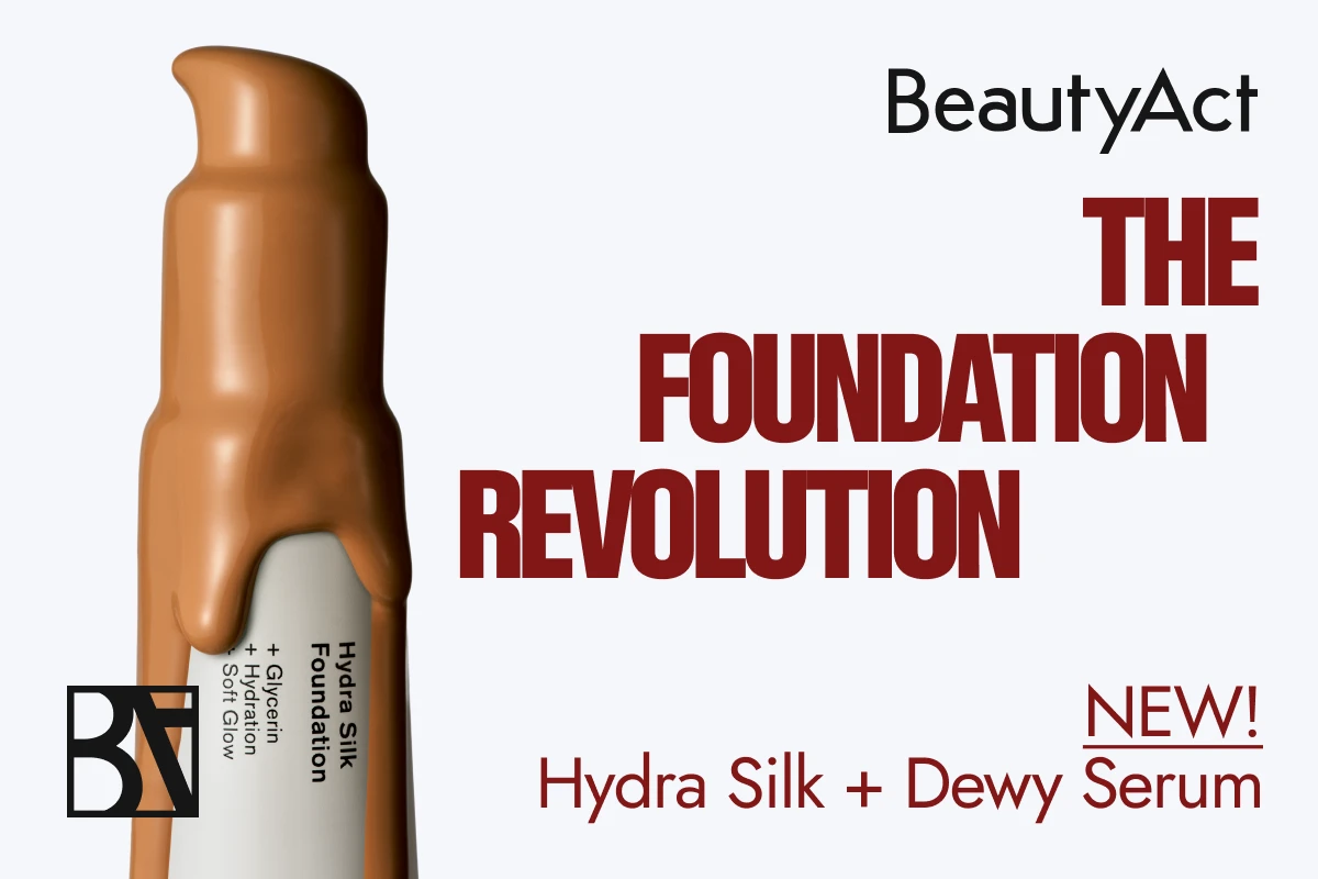 Et bilde som viser en flaske BeautyAct Hydra Silk Foundation med Dewy Serum. Teksten "THE FOUNDATION REVOLUTION" og "NEW! Hydra Silk + Dewy Serum" vises på bildet, noe som indikerer at produktet er nytt og revolusjonerende.