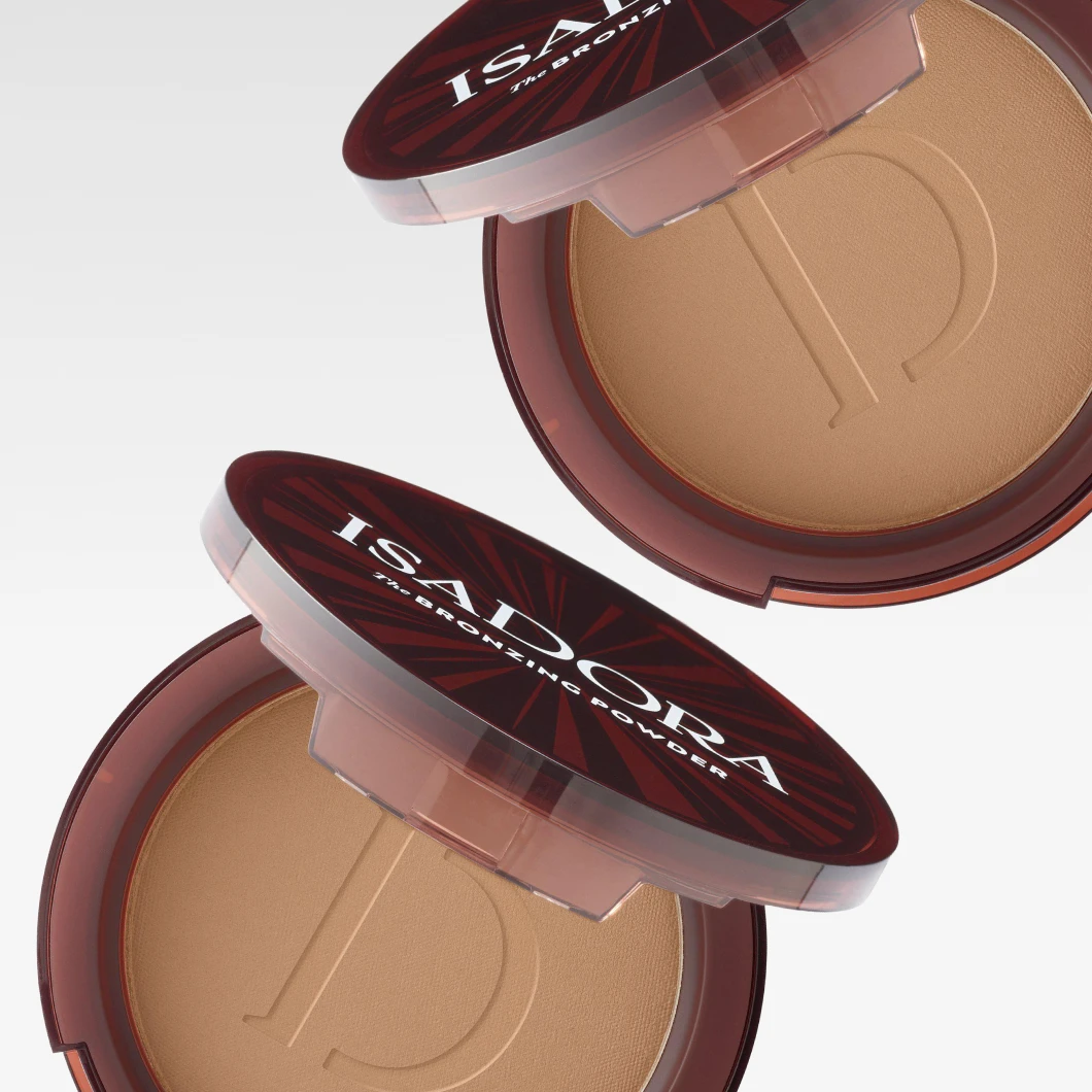 Bild som visar två brunpuder från IsaDora. Bakgrunden är vit.