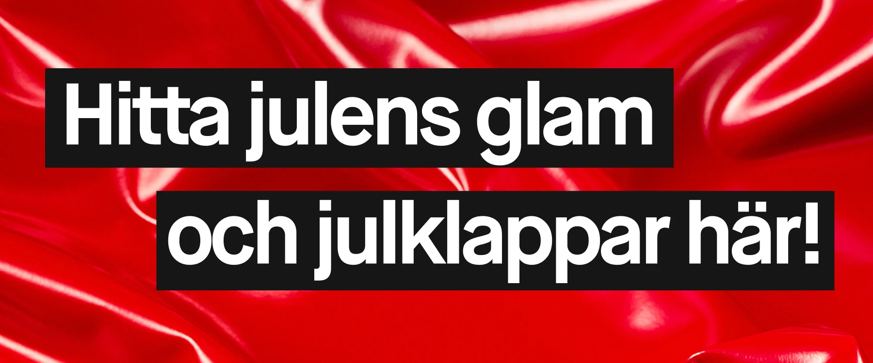 Banner med texten "Hitta julens glam och julklappar här!" mot en bakgrund av röd glänsande tyg.
