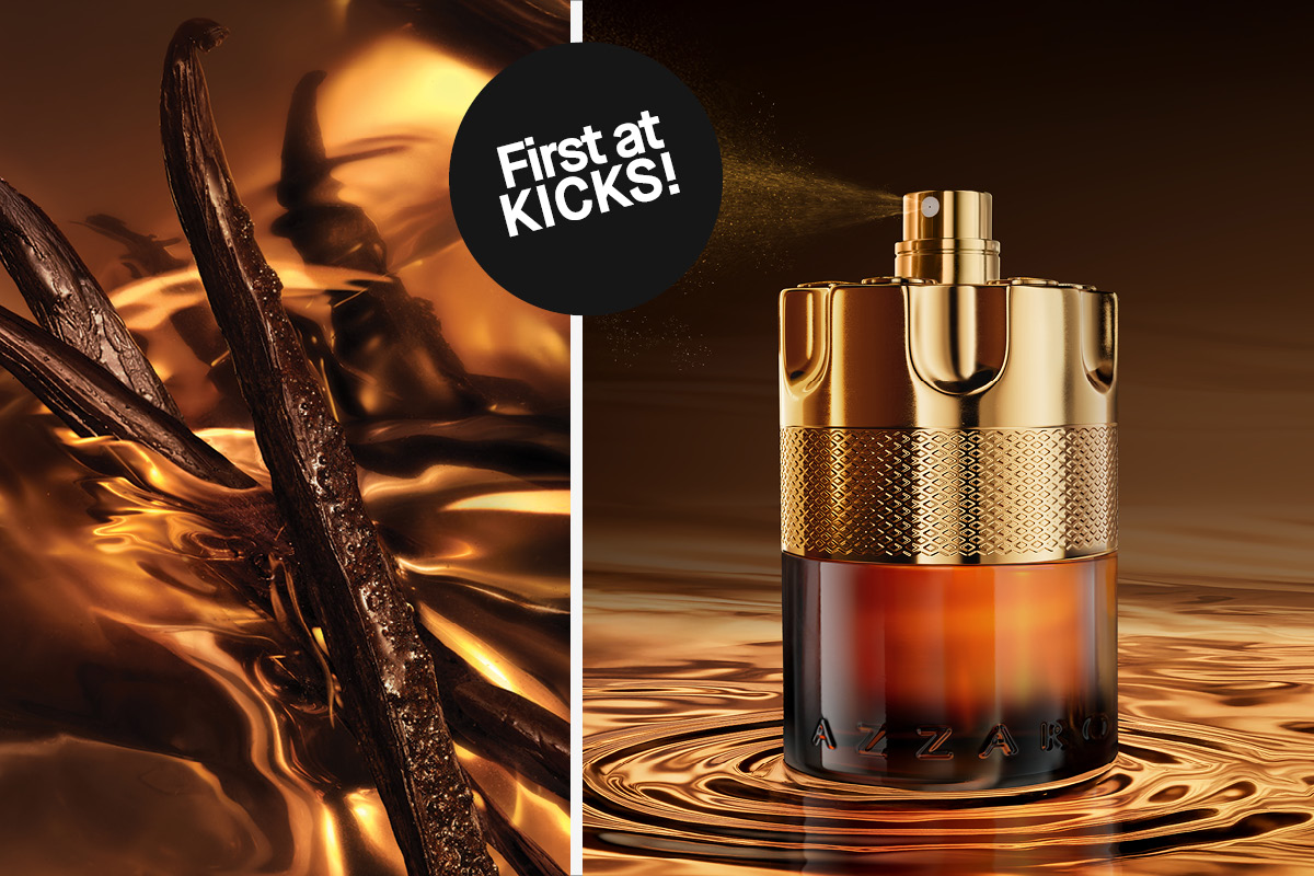 Kultainen Azzaro-hajuvesipullo ruskeassa nesteessä, taustalla vaniljatankoja ja teksti ”First at KICKS!”.