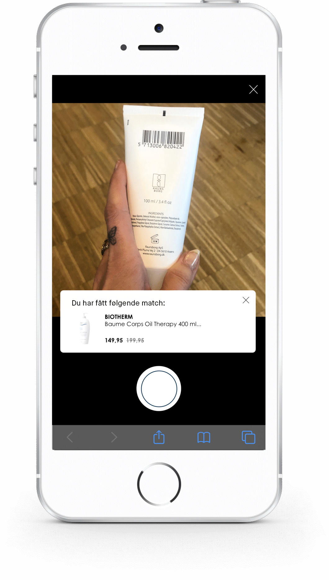 Bilde av en mobiltelefon som viser en skanning av en strekkode på et produkt, med resultatet "Strekkoden matcher følgende: BIOTHERM Baume Corps Oil Therapy 400 ml".