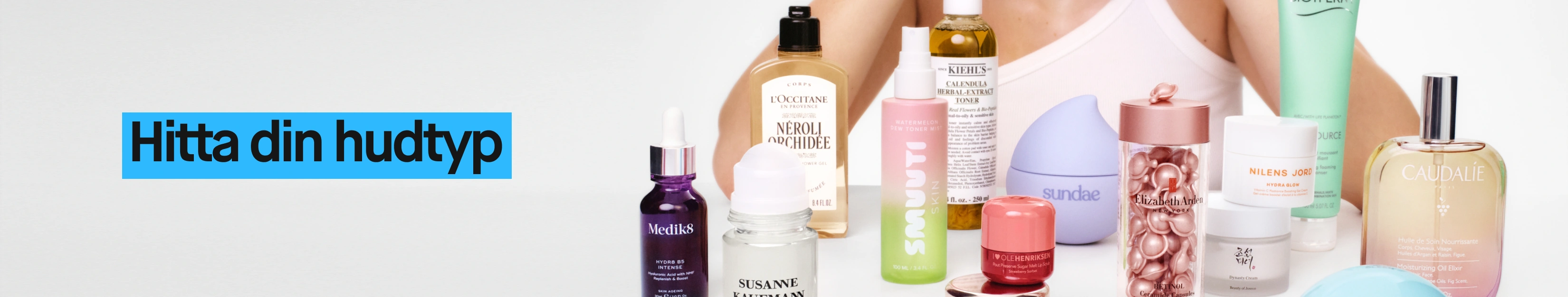 Hudvårdsprodukter från flera varumärken med texten “Hitta din hudtyp” i blå ruta.