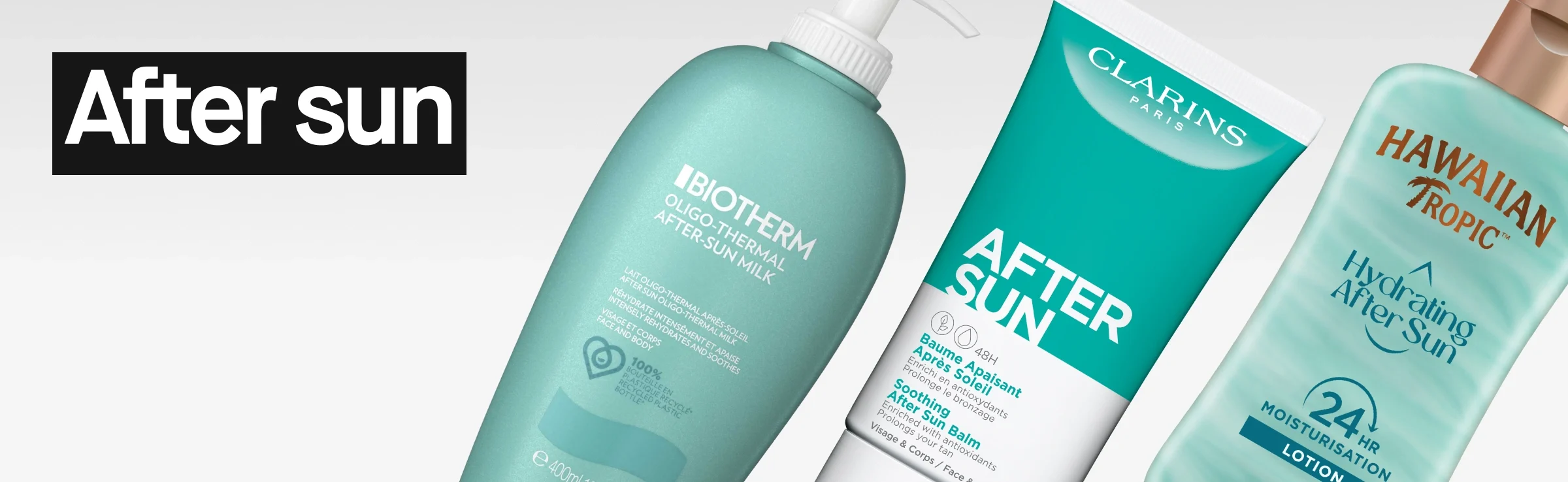 Banner med teksten «After sun» i hvit tekst på svart bakgrunn. Til høyre vises tre produkter lent mot hverandre: en turkis flaske Biotherm Oligo-Thermal After-Sun Milk med pumpe, en turkis og hvit tube Clarins After Sun Soothing Balm og en turkis flaske Hawaiian Tropic Hydrating After Sun Lotion med teksten «24 HR Moisturisation».