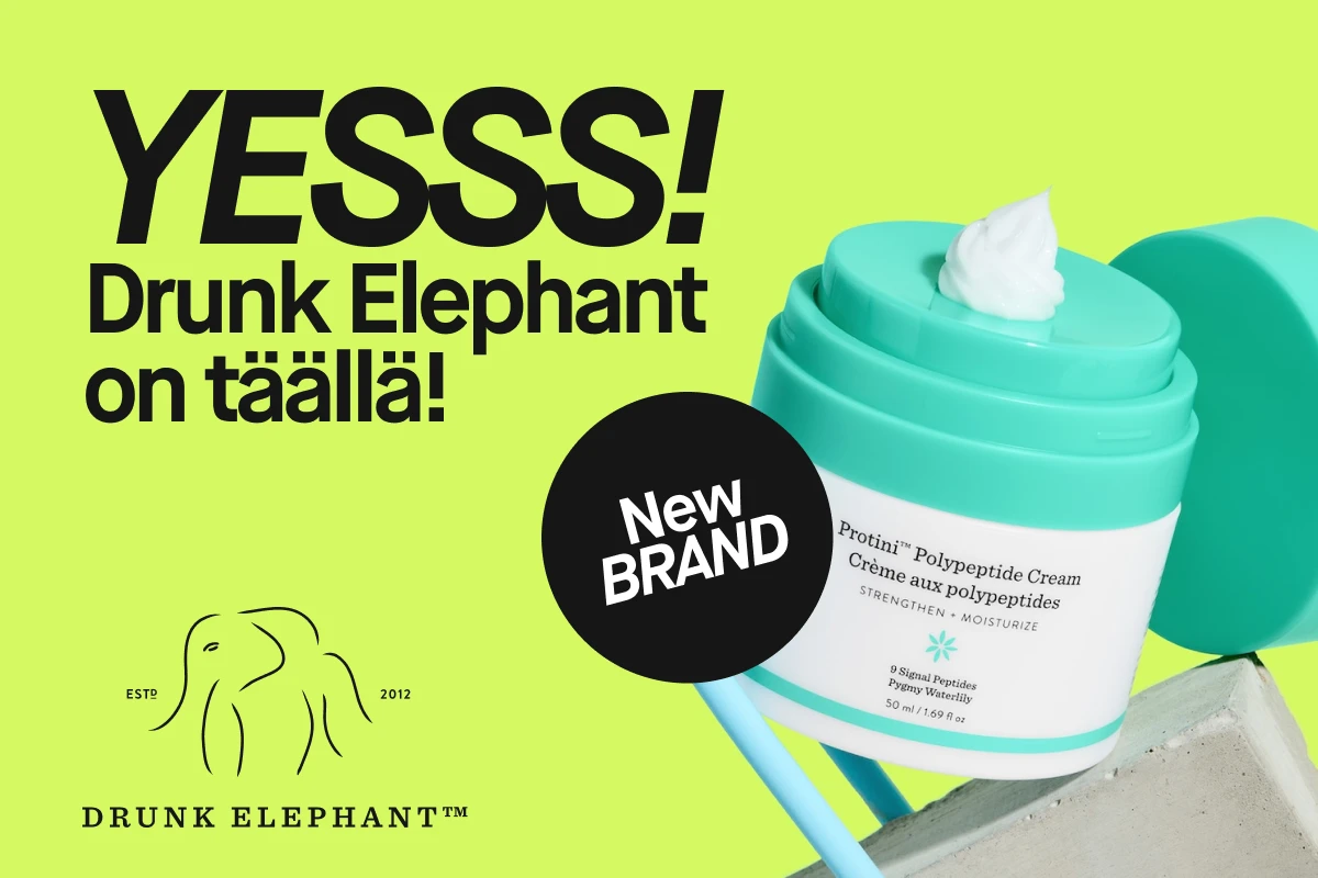 Kolme Drunk Elephant -voidetta värikkäissä purkeissa keltaisella taustalla. Vasemmalla vihreä purkki, keskellä violetti purkki, oikealla punainen purkki. Vasemmalla teksti "YESSS! Drunk Elephant on täällä!" ja musta ympyrä, jossa lukee "New BRAND".