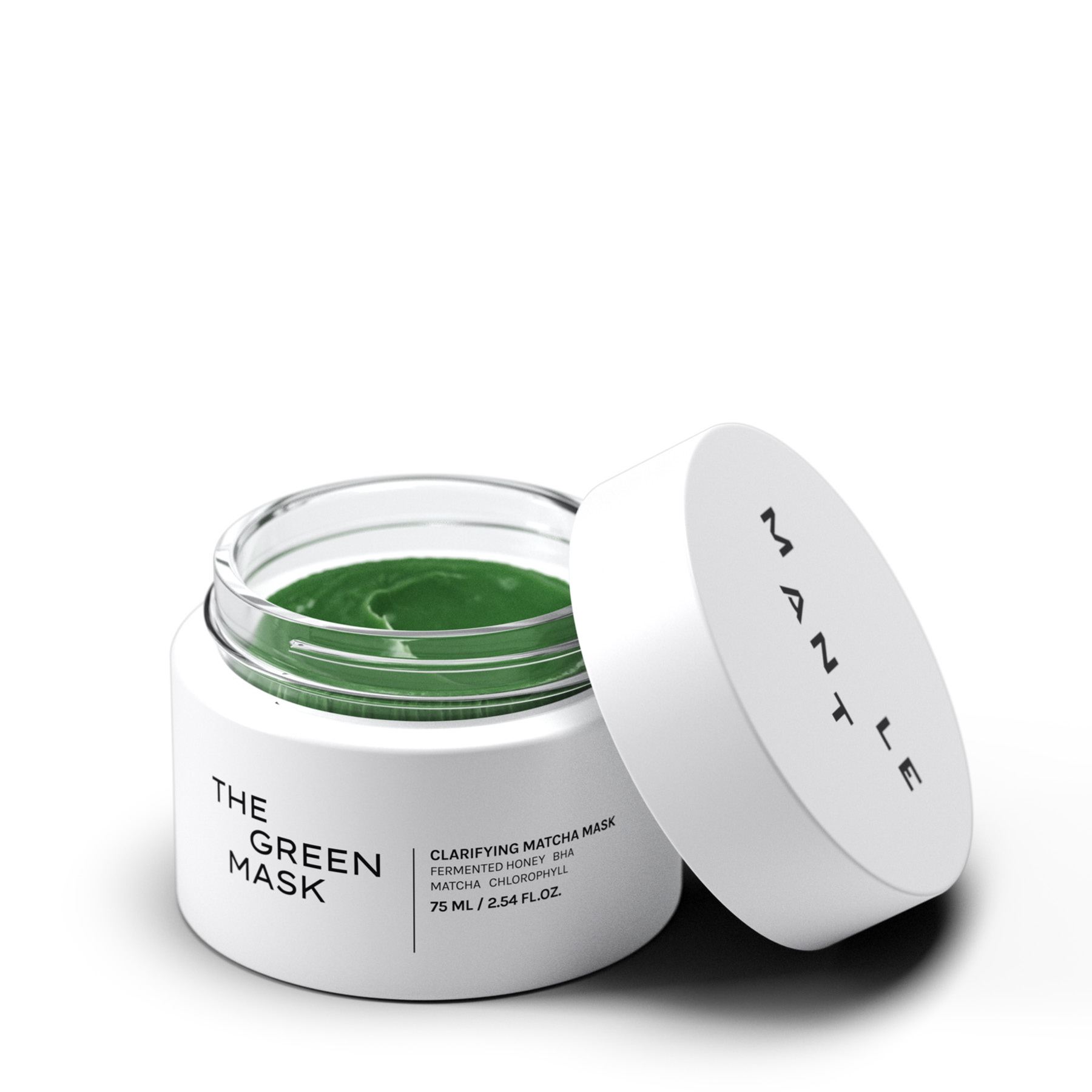 Produktbild av Mantle The Green Mask Clarifying Matcha Mask i vit burk med grönt innehåll och avtaget lock. Synlig text på förpackningen inkluderar “THE GREEN MASK”, “Clarifying Matcha Mask”, “Fermented Honey BHA Matcha Chlorophyll” och “75 ML / 2.54 FL.OZ”.